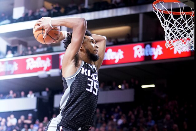 SACRAMENTO, CA - DECEMBER 12:  Marvin Bagley III #35 of the Sacramento Kings goes up for a slam dunk against the Minnesota Timberwolves during an NBA basketball game at Golden 1 Center on December 12, 2018 in Sacramento, California. NOTE TO USER: User expressly acknowledges and agrees that, by downloading and or using this photograph, User is consenting to the terms and conditions of the Getty Images License Agreement.  (Photo by Thearon W. Henderson/Getty Images)
