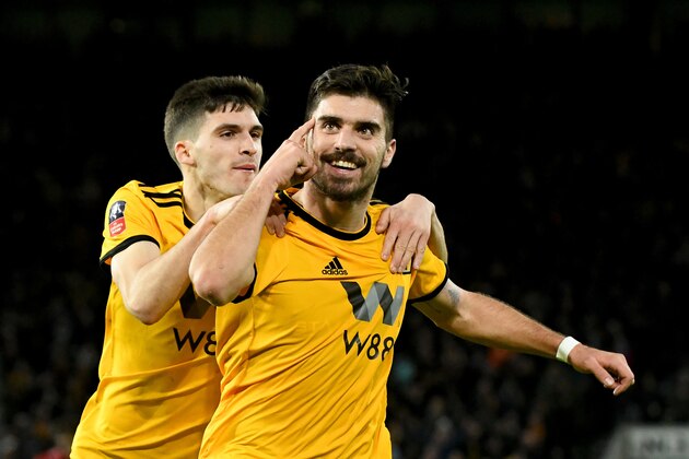 WOLVERHAMPTON, ENGLAND - JANUARY 07:  Ruben Neves of Wolverhampton Wanderers celebrates after scoring a goal to make it 2-1 during the Emirates FA Cup Third Round match between Wolverhampton Wanderers and Liverpool at Molineux on January 7, 2019 in Wolverhampton, United Kingdom. (Photo by Sam Bagnall - AMA/Getty Images)
