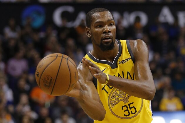 Golden State Warriors forward Kevin Durant (35) in the first half during an NBA basketball game against the Phoenix Suns, Monday, Dec. 31, 2018, in Phoenix. (AP Photo/Rick Scuteri)