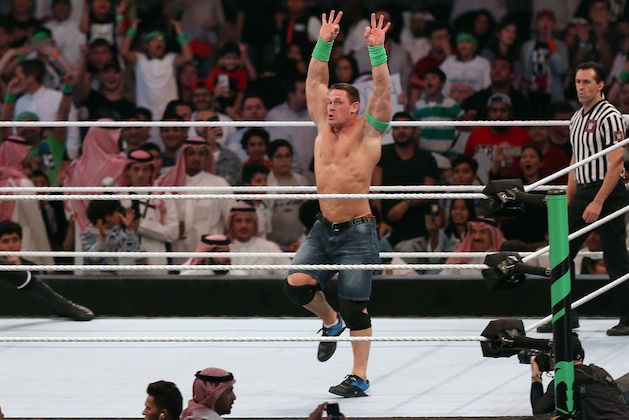 John Cena (R) competes with Triple H (L) during the World Wrestling Entertainment (WWE) Greatest Royal Rumble event in the Saudi coastal city of Jeddah on April 27, 2018. (Photo by STRINGER / AFP)        (Photo credit should read STRINGER/AFP/Getty Images)