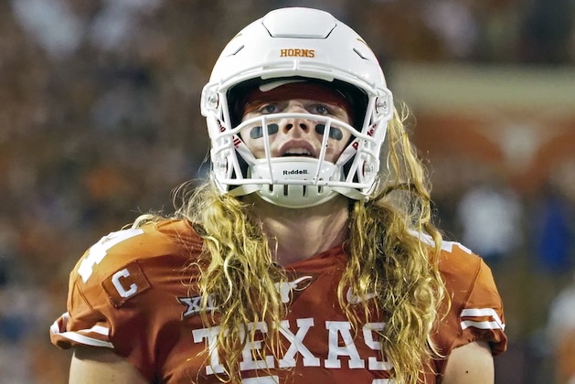 Texas lineman Breckyn Hager watches a replay during the first half of an NCAA college football game after he was called for roughing the Tulsa quarterback, Saturday, Sept. 8, 2018, in Austin, Texas. (AP Photo/Michael Thomas)