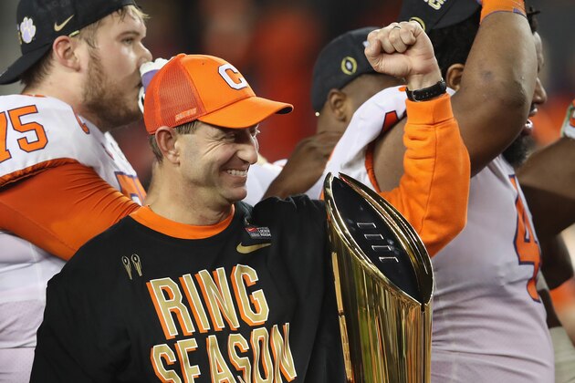 SANTA CLARA, CA - JANUARY 07:  Head coach Dabo Swinney of the Clemson Tigers celebrates his teams 44-16 win over the Alabama Crimson Tide with the trophy in the CFP National Championship presented by AT&T at Levi's Stadium on January 7, 2019 in Santa Clara, California.  (Photo by Sean M. Haffey/Getty Images)