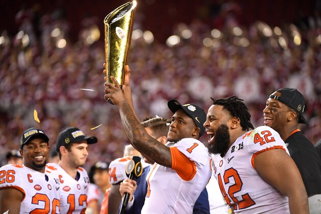 SANTA CLARA, CA - JANUARY 07: Trayvon Mullen #1 of the Clemson Tigers receives the trophy after defeating the Alabama Crimson Tide during the College Football Playoff National Championship held at Levi's Stadium on January 7, 2019 in Santa Clara, California. Clemson defeated Alabama 44-16. (Photo by Jamie Schwaberow/Getty Images)