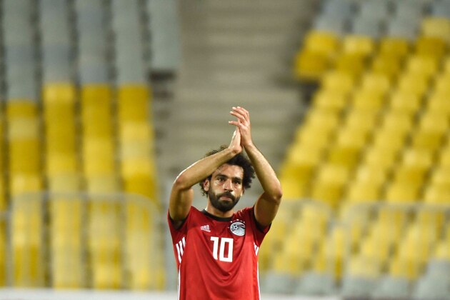 Egypts forward Mohamed Salah (C) greets fans after the 2019 Africa Cup of Nations qualifier football match between Egypt and Niger on September 8, 2018 at the Borg el-Arab stadium near the Mediterranean city of Alexandria. (Photo by Khaled DESOUKI / AFP)        (Photo credit should read KHALED DESOUKI/AFP/Getty Images)