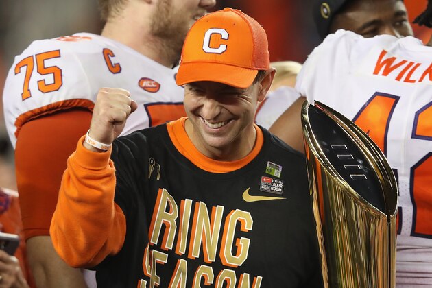 SANTA CLARA, CA - JANUARY 07:  Head coach Dabo Swinney of the Clemson Tigers celebrates his teams 44-16 win over the Alabama Crimson Tide with the trophy in the CFP National Championship presented by AT&T at Levi's Stadium on January 7, 2019 in Santa Clara, California.  (Photo by Sean M. Haffey/Getty Images)