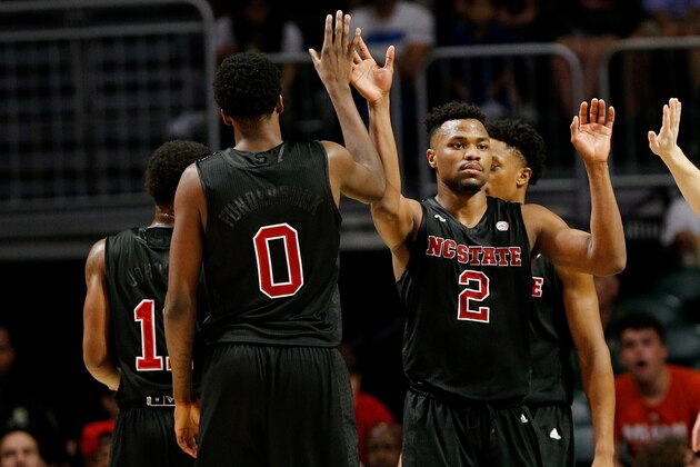 MIAMI, FL - JANUARY 03:  Torin Dorn #2 of the North Carolina State Wolfpack celebrates with teammates after a basket against the Miami Hurricanes during the second half at Watsco Center on January 3, 2019 in Miami, Florida.  (Photo by Michael Reaves/Getty Images)
