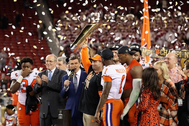 SANTA CLARA, CA - JANUARY 07:  Head coach Dabo Swinney and Trayvon Mullen #1 of the Clemson Tigers celebrate their teams 44-16 win over the Alabama Crimson Tide with the trophy in the CFP National Championship presented by AT&T at Levi's Stadium on January 7, 2019 in Santa Clara, California.  (Photo by Christian Petersen/Getty Images)