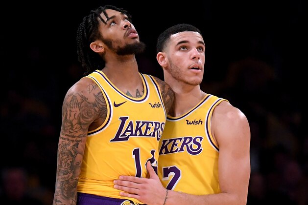 LOS ANGELES, CA - OCTOBER 20:  Brandon Ingram #14 of the Los Angeles Lakers is restrained by Lonzo Ball #2 of the Los Angeles Lakers during a 124-115 loss to the Houston Rockets at Staples Center on October 20, 2018 in Los Angeles, California.  (Photo by Harry How/Getty Images)