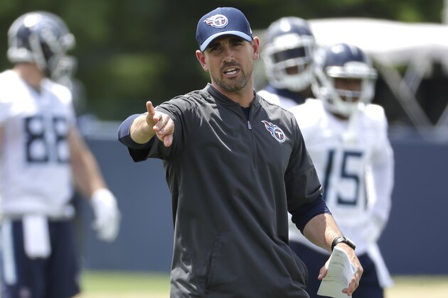 FILE - In this May 22, 2018, file photo, Tennessee Titans offensive coordinator Matt LaFleur runs a drill during an organized team activity at the Titans' NFL football training facility in Nashville, Tenn. LaFleur makes his debut calling plays for the Titans' offense on Thursday night, Aug. 9 in Green Bay. (AP Photo/Mark Humphrey, File)