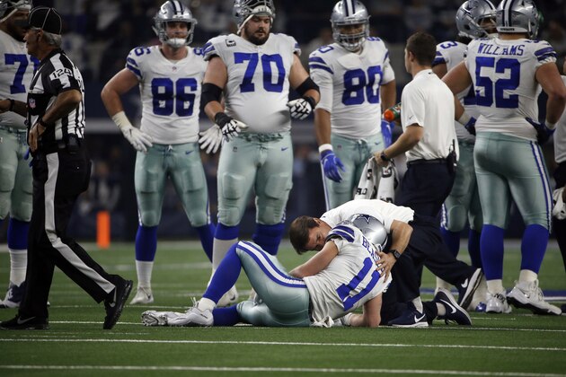 Dallas Cowboys wide receiver Cole Beasley (11) lays on the field with an unknown injury after making a catch during an NFC wild-card NFL football game against the Seattle Seahawks in Arlington, Texas, Saturday, Jan. 5, 2019.(AP Photo/Ron Jenkins)