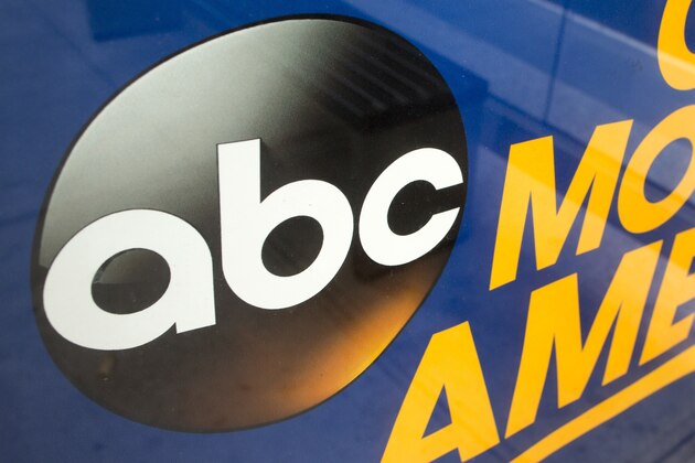 FILE - This Wednesday, May 10, 2017, file photo shows the ABC logo, a Disney brand, in an advertisement at a bus stop near their television studio on the West Side of Manhattan, in New York. The Walt Disney Co. reports financial results on Thursday, Nov. 9, 2017. (AP Photo/Mary Altaffer, File)