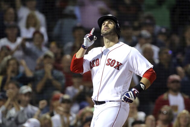 Boston Red Sox's J.D. Martinez celebrates his solo home run as he crosses the plate in the second inning of a baseball game against the Toronto Blue Jays at Fenway Park, Thursday, Sept. 13, 2018, in Boston. (AP Photo/Elise Amendola) Boston Red Sox's J.D. Martinez celebrates his solo home run as he crosses the plate in the second inning of a baseball game against the Toronto Blue Jays at Fenway Park, Thursday, Sept. 13, 2018, in Boston. (AP Photo/Elise Amendola)