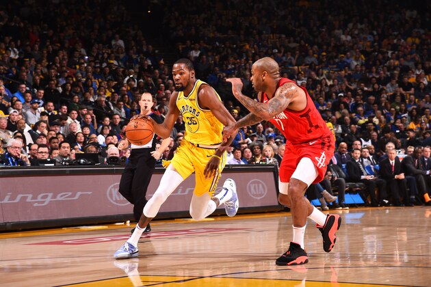 OAKLAND, CA - JANUARY 3: Kevin Durant #35 of the Golden State Warriors handles the ball against the Houston Rockets on January 3, 2019 at ORACLE Arena in Oakland, California. NOTE TO USER: User expressly acknowledges and agrees that, by downloading and or using this photograph, user is consenting to the terms and conditions of Getty Images License Agreement. Mandatory Copyright Notice: Copyright 2019 NBAE (Photo by Noah Graham/NBAE via Getty Images) OAKLAND, CA - JANUARY 3: Kevin Durant #35 of the Golden State Warriors handles the ball against the Houston Rockets on January 3, 2019 at ORACLE Arena in Oakland, California. NOTE TO USER: User expressly acknowledges and agrees that, by downloading and or using this photograph, user is consenting to the terms and conditions of Getty Images License Agreement. Mandatory Copyright Notice: Copyright 2019 NBAE (Photo by Noah Graham/NBAE via Getty Images)