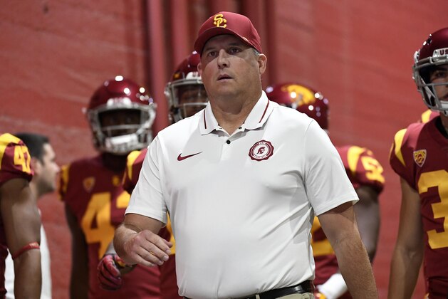 LOS ANGELES, CA - NOVEMBER 24: Head coach Clay Helton of the USC Trojans walks his team down the tunnel at Los Angeles Memorial Coliseum to play against the Notre Dame Fighting Irish on November 24, 2018 in Los Angeles, California. (Photo by Kevork Djansezian/Getty Images)
