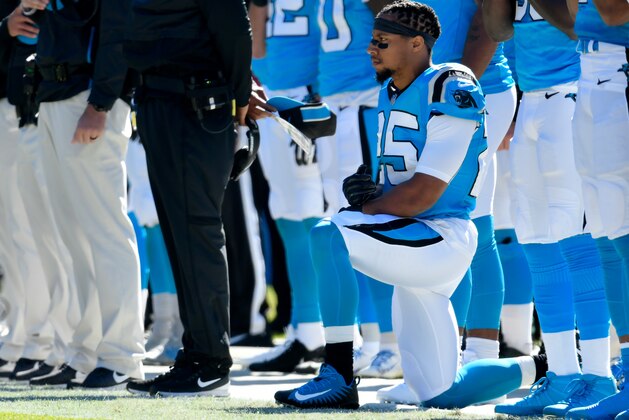 CHARLOTTE, NC - OCTOBER 28:  Eric Reid #25 of the Carolina Panthers kneels during the anthem against the Baltimore Ravens at Bank of America Stadium on October 28, 2018 in Charlotte, North Carolina.  (Photo by Grant Halverson/Getty Images)