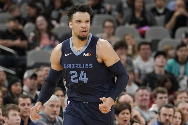 Memphis Grizzlies' Dillon Brooks celebrates a three-point basket during the second half of an NBA basketball game against the San Antonio Spurs, Saturday, Jan. 5, 2019, in San Antonio. (AP Photo/Darren Abate)