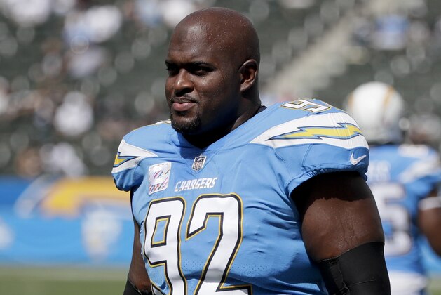 Los Angeles Chargers defensive tackle Brandon Mebane warms up before an NFL football game against the Oakland Raiders Sunday, Oct. 7, 2018, in Carson, Calif. (AP Photo/Jae C. Hong)