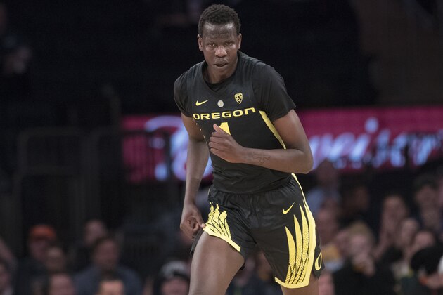 Oregon center Bol Bol runs down court during the first half of an NCAA college basketball game against Iowa in the 2K Empire Classic, Thursday, Nov. 15, 2018, at Madison Square Garden in New York. (AP Photo/Mary Altaffer)