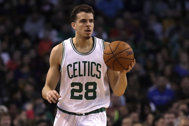 Boston Celtics guard R.J. Hunter (28) brings the ball up court during the second half of a preseason NBA basketball game in Boston, Monday, Oct. 17, 2016. The Celtics defeated the Nets 120-99. (AP Photo/Charles Krupa)
