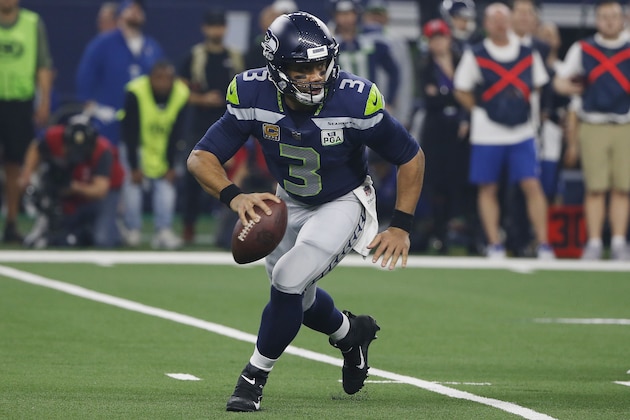 Seattle Seahawks quarterback Russell Wilson (3) runs out of the pocket against the Seattle Seahawks first half of the NFC wild-card NFL football game in Arlington, Texas, Saturday, Jan. 5, 2019. (AP Photo/Ron Jenkins)