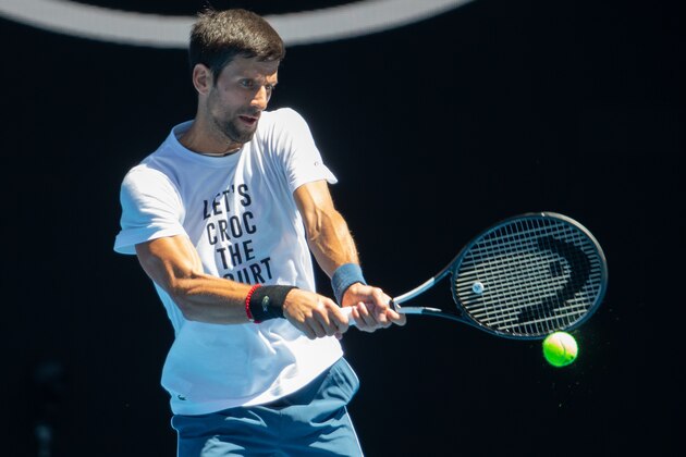 Novak Djokovic of Serbia plays a backhand shot during a practice session in Melbourne on January 9, 2019, ahead of the Australian Open tennis tournament. (Photo by ASANKA BRENDON RATNAYAKE / AFP) / -- IMAGE RESTRICTED TO EDITORIAL USE - STRICTLY NO COMMERCIAL USE --        (Photo credit should read ASANKA BRENDON RATNAYAKE/AFP/Getty Images)