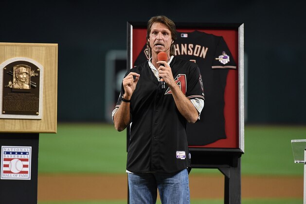 PHOENIX, AZ - AUGUST 08:  Former Arizona Diamondbacks pitcher Randy Johnson #51 talks to the fans prior to a game against the Cincinnati Reds at Chase Field on August 8, 2015 in Phoenix, Arizona. The Arizona Diamondbacks retired his number #51 during a pregame ceremony.  (Photo by Norm Hall/Getty Images)