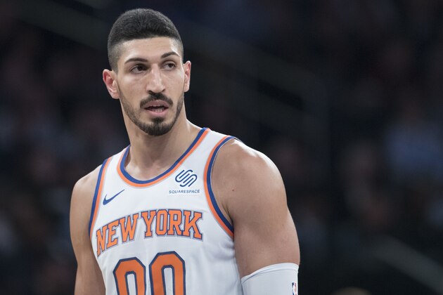 New York Knicks center Enes Kanter pauses on the court during the first half of an NBA basketball game against the Boston Celtics, Saturday, Oct. 20, 2018, at Madison Square Garden in New York. (AP Photo/Mary Altaffer)