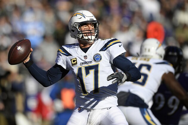 Los Angeles Chargers quarterback Philip Rivers throws a pass in the first half of an NFL wild card playoff football game against the Baltimore Ravens, Sunday, Jan. 6, 2019, in Baltimore. (AP Photo/Nick Wass)
