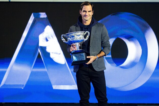 Roger Federer of Switzerland poses with the men's singles trophy during the draw for the Australian Open tennis tournament in Melbourne on January 10, 2019. (Photo by ASANKA BRENDON RATNAYAKE / AFP) / -- IMAGE RESTRICTED TO EDITORIAL USE - STRICTLY NO COMMERCIAL USE --        (Photo credit should read ASANKA BRENDON RATNAYAKE/AFP/Getty Images)