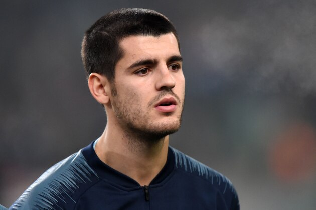 Chelsea's Spanish forward Alvaro Morata poses for a family picture during the UEFA Europa League Group L football match between MOL Vidi FC and Chelsea on December 13, 2018 in Budapest. (Photo by ATTILA KISBENEDEK / AFP)        (Photo credit should read ATTILA KISBENEDEK/AFP/Getty Images)