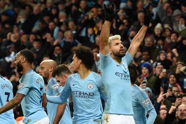 Manchester City's Argentinian striker Sergio Aguero (R) celebrates with teammates after scoring the opening goal of the English Premier League football match between Manchester City and Liverpool at the Etihad Stadium in Manchester, north west England, on January 3, 2019. (Photo by Paul ELLIS / AFP) / RESTRICTED TO EDITORIAL USE. No use with unauthorized audio, video, data, fixture lists, club/league logos or 'live' services. Online in-match use limited to 120 images. An additional 40 images may be used in extra time. No video emulation. Social media in-match use limited to 120 images. An additional 40 images may be used in extra time. No use in betting publications, games or single club/league/player publications. / (Photo credit should read PAUL ELLIS/AFP/Getty Images) Manchester City's Argentinian striker Sergio Aguero (R) celebrates with teammates after scoring the opening goal of the English Premier League football match between Manchester City and Liverpool at the Etihad Stadium in Manchester, north west England, on January 3, 2019. (Photo by Paul ELLIS / AFP) / RESTRICTED TO EDITORIAL USE. No use with unauthorized audio, video, data, fixture lists, club/league logos or 'live' services. Online in-match use limited to 120 images. An additional 40 images may be used in extra time. No video emulation. Social media in-match use limited to 120 images. An additional 40 images may be used in extra time. No use in betting publications, games or single club/league/player publications. / (Photo credit should read PAUL ELLIS/AFP/Getty Images)