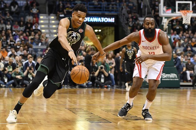 MILWAUKEE, WI - MARCH 07:  Giannis Antetokounmpo #34 of the Milwaukee Bucks drives around James Harden #13 of the Houston Rockets during a game at the Bradley Center on March 7, 2018 in Milwaukee, Wisconsin.  NOTE TO USER: User expressly acknowledges and agrees that, by downloading and or using this photograph, User is consenting to the terms and conditions of the Getty Images License Agreement.  (Photo by Stacy Revere/Getty Images)