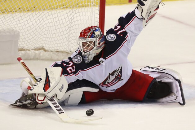 Columbus Blue Jackets goaltender Sergei Bobrovsky (72) makes a save during the third period of an NHL hockey game against the Florida Panthers, Saturday, Jan. 5, 2019 in Sunrise, Fla. The Blue Jackets defeated the Panthers 4-3 in overtime. (AP Photo/Wilfredo Lee)