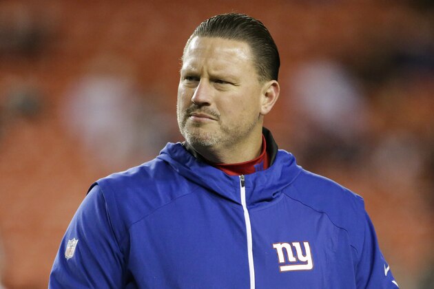New York Giants head coach Ben McAdoo walks across the field before an NFL football game against the Washington Redskins in Landover, Md., Thursday, Nov. 23, 2017. (AP Photo/Mark Tenally)