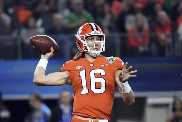 Clemson quarterback Trevor Lawrence (16) throws a pass in the first half of the NCAA Cotton Bowl semi-final playoff football game against Notre Dame on Saturday, Dec. 29, 2018, in Arlington, Texas. (AP Photo/Jeffrey McWhorter) Clemson quarterback Trevor Lawrence (16) throws a pass in the first half of the NCAA Cotton Bowl semi-final playoff football game against Notre Dame on Saturday, Dec. 29, 2018, in Arlington, Texas. (AP Photo/Jeffrey McWhorter)