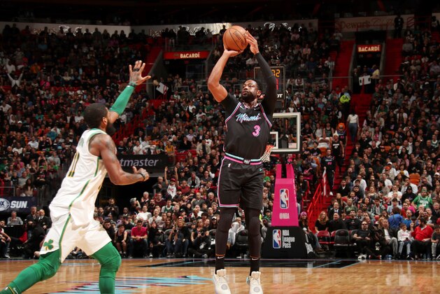 MIAMI, FL - JANUARY 10: Dwyane Wade #3 of the Miami Heat shoots the ball against the Boston Celtics on January 10, 2019 at American Airlines Arena in Miami, Florida. NOTE TO USER: User expressly acknowledges and agrees that, by downloading and or using this Photograph, user is consenting to the terms and conditions of the Getty Images License Agreement. Mandatory Copyright Notice: Copyright 2019 NBAE (Photo by Issac Baldizon/NBAE via Getty Images)