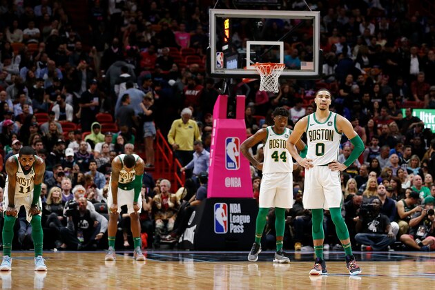 MIAMI, FL - JANUARY 10: Kyrie Irving #11, Marcus Morris #13, Robert Williams #44 and Jayson Tatum #0 of the Boston Celtics look on against the Miami Heat during the second half at American Airlines Arena on January 10, 2019 in Miami, Florida. NOTE TO USER: User expressly acknowledges and agrees that, by downloading and or using this photograph, User is consenting to the terms and conditions of the Getty Images License Agreement. (Photo by Michael Reaves/Getty Images) MIAMI, FL - JANUARY 10: Kyrie Irving #11, Marcus Morris #13, Robert Williams #44 and Jayson Tatum #0 of the Boston Celtics look on against the Miami Heat during the second half at American Airlines Arena on January 10, 2019 in Miami, Florida. NOTE TO USER: User expressly acknowledges and agrees that, by downloading and or using this photograph, User is consenting to the terms and conditions of the Getty Images License Agreement. (Photo by Michael Reaves/Getty Images)