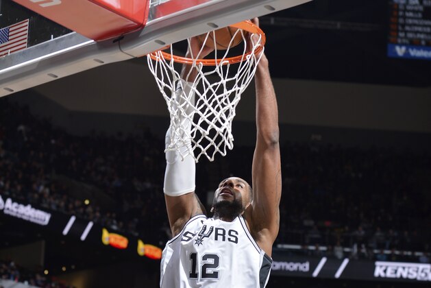 SAN ANTONIO, TX - JANUARY 10: LaMarcus Aldridge #12 of the San Antonio Spurs goes up for a dunk against the Oklahoma City Thunder on January 10, 2019 at the AT&T Center in San Antonio, Texas. NOTE TO USER: User expressly acknowledges and agrees that, by downloading and or using this photograph, user is consenting to the terms and conditions of the Getty Images License Agreement. Mandatory Copyright Notice: Copyright 2019 NBAE (Photos by Mark Sobhani/NBAE via Getty Images)