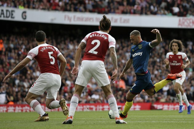 West Ham's Marko Arnautovic, 2nd from right, scores his side opening goal during the English Premier League soccer match between Arsenal and West Ham United at the Emirates Stadium in London, Saturday Aug. 25, 2018. (AP Photo/Tim Ireland) West Ham's Marko Arnautovic, 2nd from right, scores his side opening goal during the English Premier League soccer match between Arsenal and West Ham United at the Emirates Stadium in London, Saturday Aug. 25, 2018. (AP Photo/Tim Ireland)