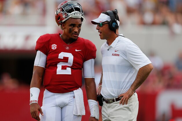 TUSCALOOSA, AL - SEPTEMBER 08: Jalen Hurts #2 of the Alabama Crimson Tide converses with quarterbacks coach Dan Enos during the game against the Arkansas State Red Wolves at Bryant-Denny Stadium on September 8, 2018 in Tuscaloosa, Alabama. (Photo by Kevin C. Cox/Getty Images) TUSCALOOSA, AL - SEPTEMBER 08: Jalen Hurts #2 of the Alabama Crimson Tide converses with quarterbacks coach Dan Enos during the game against the Arkansas State Red Wolves at Bryant-Denny Stadium on September 8, 2018 in Tuscaloosa, Alabama. (Photo by Kevin C. Cox/Getty Images)