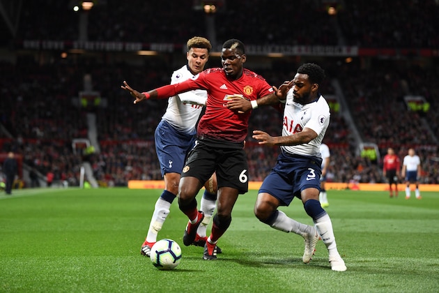 MANCHESTER, ENGLAND - AUGUST 27:  Dele Alli of Tottenham Hotspur, Paul Pogba of Manchester United and Danny Rose of Tottenham Hotspur battle for possession during the Premier League match between Manchester United and Tottenham Hotspur at Old Trafford on August 27, 2018 in Manchester, United Kingdom.  (Photo by Clive Mason/Getty Images)