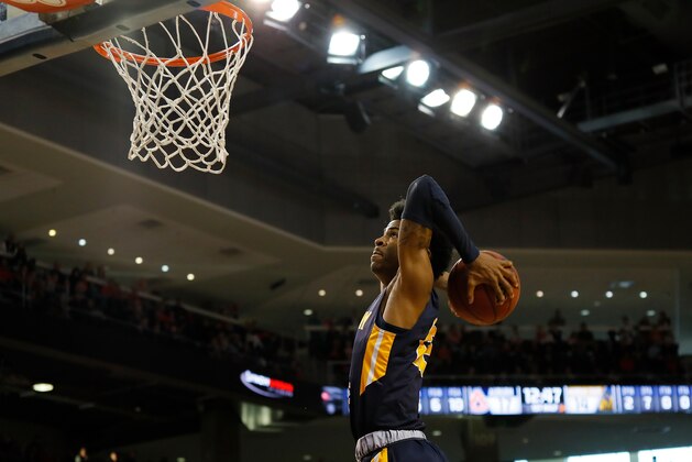 AUBURN, ALABAMA - DECEMBER 22:  Ja Morant #12 of the Murray State Racers goes up for a dunk against the Auburn Tigers at Auburn Arena on December 22, 2018 in Auburn, Alabama. (Photo by Kevin C.  Cox/Getty Images)