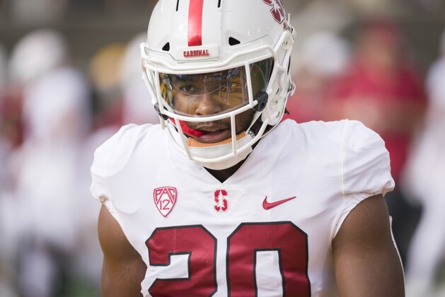 BERKELEY, CA - DECEMBER 1:  Bryce Love #20 of the Stanford Cardinal warms up before the 121st Big Game between Stanford and the University of California Golden Bears played on December 1, 2018 at Memorial Stadium in Berkeley, California.  (Photo by David Madison/Getty Images)