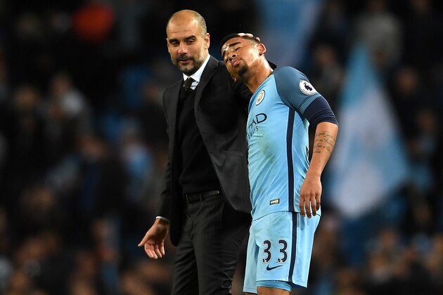 MANCHESTER, ENGLAND - APRIL 27:  Gabriel Jesus of Manchester City and Josep Guardiola, Manager of Manchester City speak after the full time whistle during the Premier League match between Manchester City and Manchester United at Etihad Stadium on April 27, 2017 in Manchester, England.  (Photo by Laurence Griffiths/Getty Images)