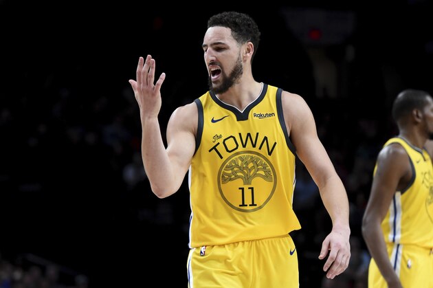 Golden State Warriors guard Klay Thompson reacts after hitting a shot late in the second half of the team's NBA basketball game against the Portland Trail Blazers in Portland, Ore., Saturday, Dec. 29, 2018. The Warriors won 115-105. (AP Photo/Steve Dykes)