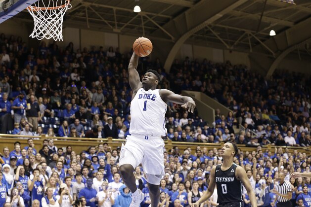 Duke's Zion Williamson (1) drives for a dunk against Stetson during the second half of an NCAA college basketball game in Durham, N.C., Saturday, Dec. 1, 2018. (AP Photo/Gerry Broome)
