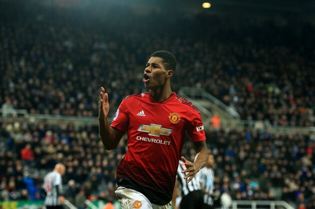 Manchester United's English striker Marcus Rashford celebrates scoring his team's second goal during the English Premier League football match between Newcastle United and Manchester United at St James' Park in Newcastle-upon-Tyne, north east England on January 2, 2019. (Photo by Lindsey PARNABY / AFP) / RESTRICTED TO EDITORIAL USE. No use with unauthorized audio, video, data, fixture lists, club/league logos or 'live' services. Online in-match use limited to 120 images. An additional 40 images may be used in extra time. No video emulation. Social media in-match use limited to 120 images. An additional 40 images may be used in extra time. No use in betting publications, games or single club/league/player publications. /         (Photo credit should read LINDSEY PARNABY/AFP/Getty Images)