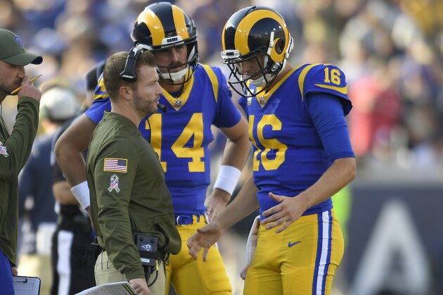 LOS ANGELES, CA - NOVEMBER 11: Head coach Sean McVay and Sean Mannion #14 talk to Jared Goff #16 of the Los Angeles Rams during a game with the Seattle Seahawks  at Los Angeles Memorial Coliseum on November 11, 2018 in Los Angeles, California. The Rams won 36-31. (Photo by John McCoy/Getty Images)