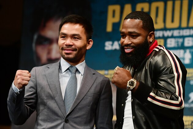 NEW YORK, NY - NOVEMBER 19: Manny Pacquiao (L) and Adrien Broner face off during a press conference at Gotham Hall in preparation for their upcoming match on November 19, 2018 in New York City. The match is set to take place on January 19, 2019 in Las Vegas. (Photo by Sarah Stier/Getty Images)