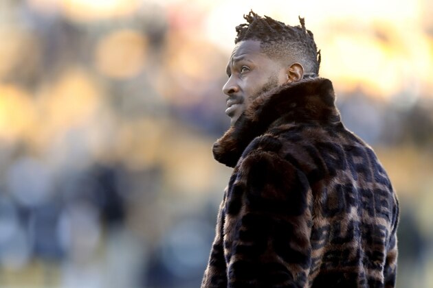 In this photo from Dec. 30, 2018, Pittsburgh Steelers wide receiver Antonio Brown stands on the sideline before an NFL football game against the Cincinnati Bengals, in Pittsburgh. Pittsburgh Steelers head coach Mike Tomlin says he's disappointed in the behavior of star wide receiver Antonio Brown but added the team has not received any formal trade request from Brown's camp. (AP Photo/Don Wright)